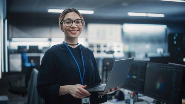 Happy worker with laptop