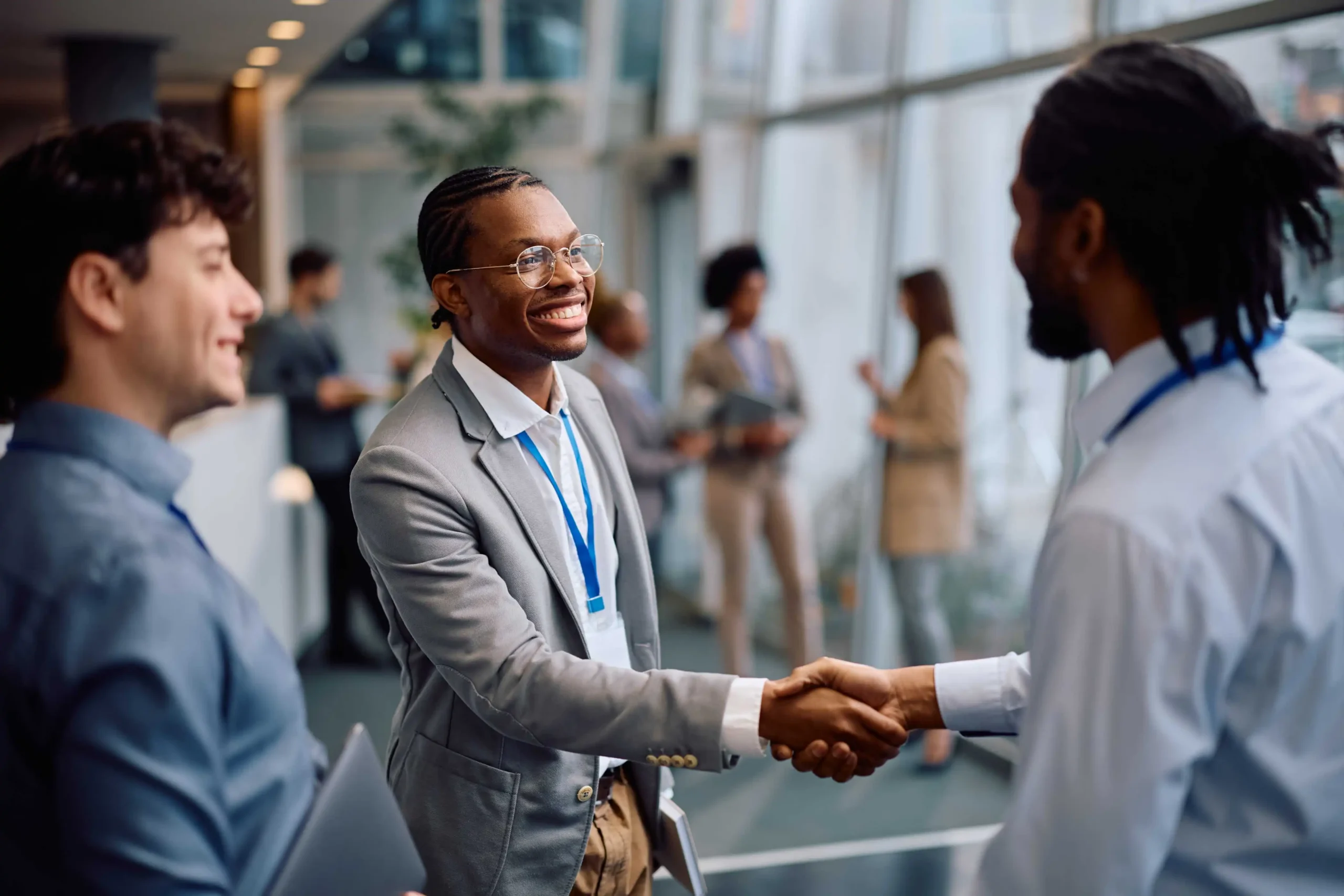 Happy Black Businessman Shaking Hands with His Colleague at Dreamforce